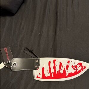 Red and White Knife-Shaped Bag